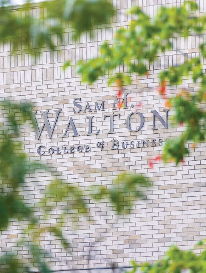 Photo of Walton College Logo on a building