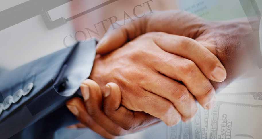 Shaking hands over a contract