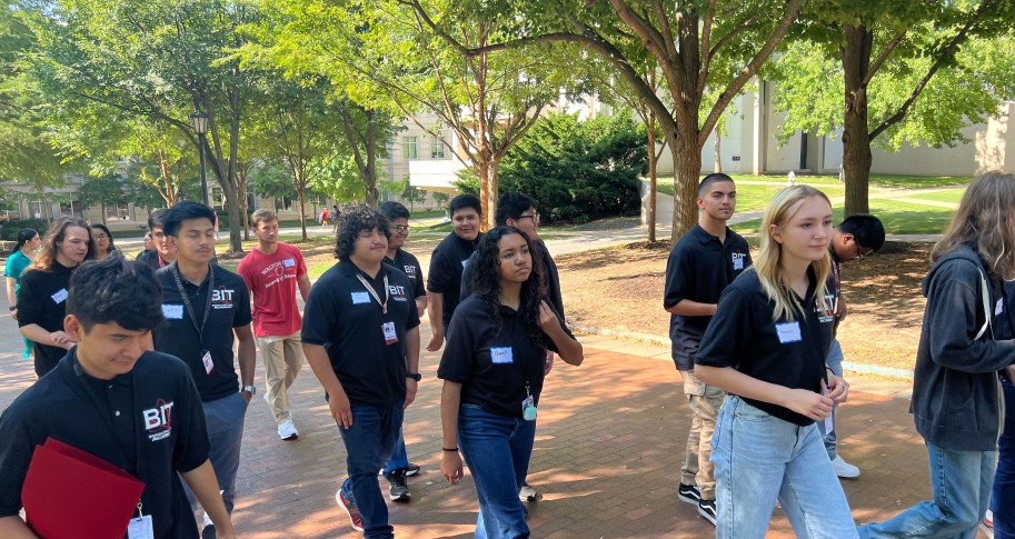 Springdale High School mentees tour the Walton campus with current MBA mentors