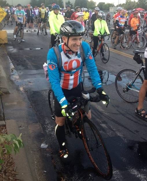 Dr. Spann cycling in the Iron Man Triathlon