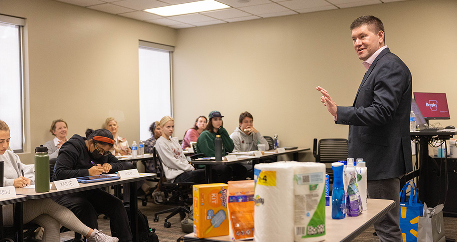 Guest lecturer Jeff Metzner, vice president of Walmart team marketing and communications at Procter & Gamble, shares his marketing and branding expertise in professor Molly Rapert’s marketing class.