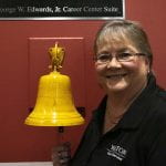 After 30 years of service, Renee Clay rings the Career Services bell to announce her retirement.