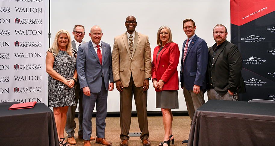 Announcing the agreement between the U of A and UACCM were (L-R) Karen Boston, Gary Peters, Brent Williams, Charles Robinson, Lisa Willenberg, Richard Counts and Robert Keeton.