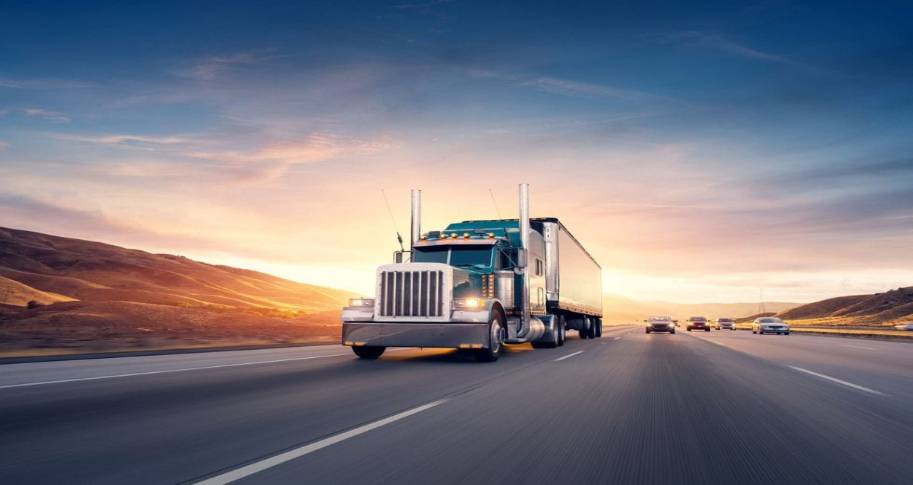 truck and cars on road