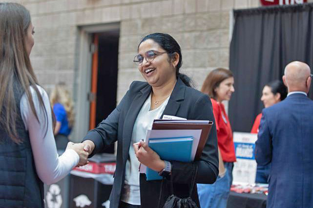 students photographed at event