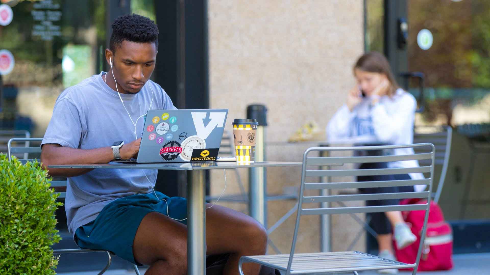 Students with Laptop Outside