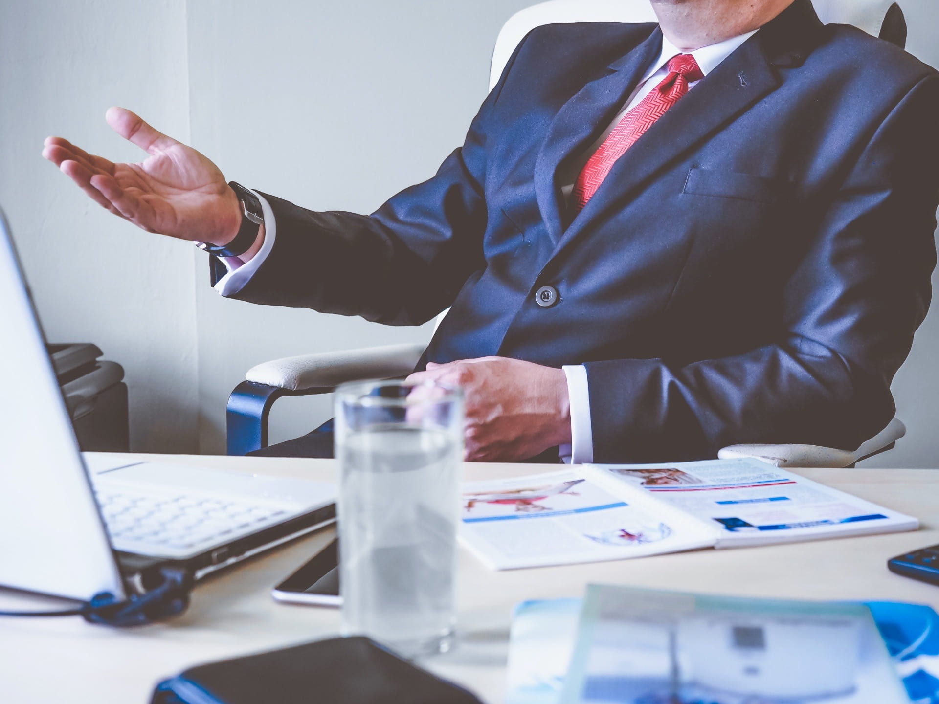 Man in Suit at Desk