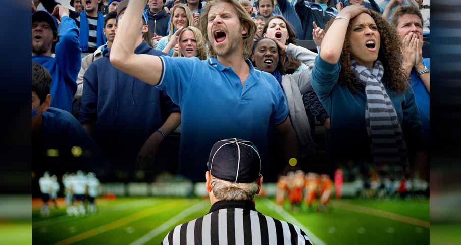 A ref and sports fans; Article: "When Refs Make Bad Calls: Decision Making Under Pressure" by Mitchell Simpson with research by Adam Stoverink and Marilla Hayman Kingsley