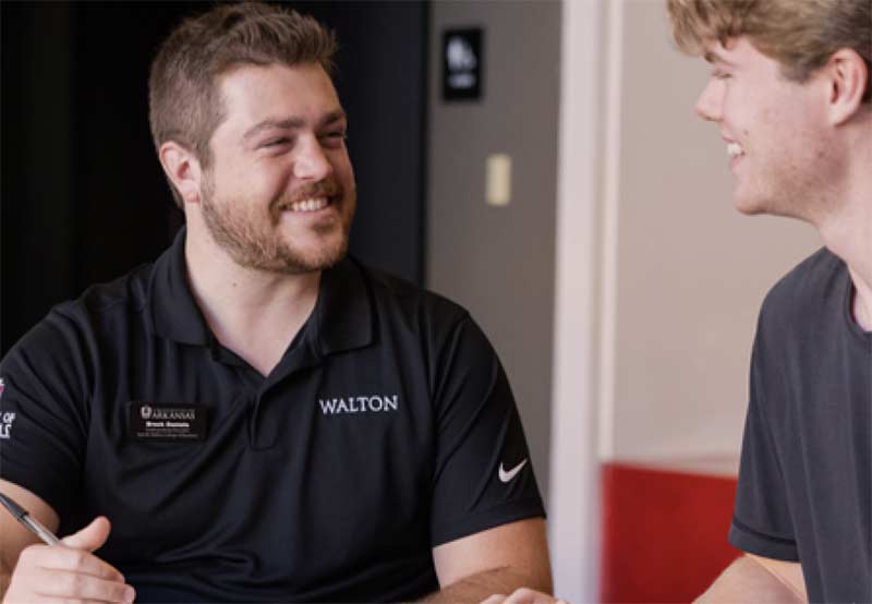 Photo of a walton business student being advised.